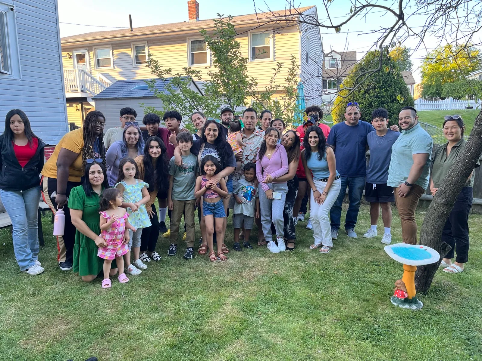 Friends talking at a backyard gathering
