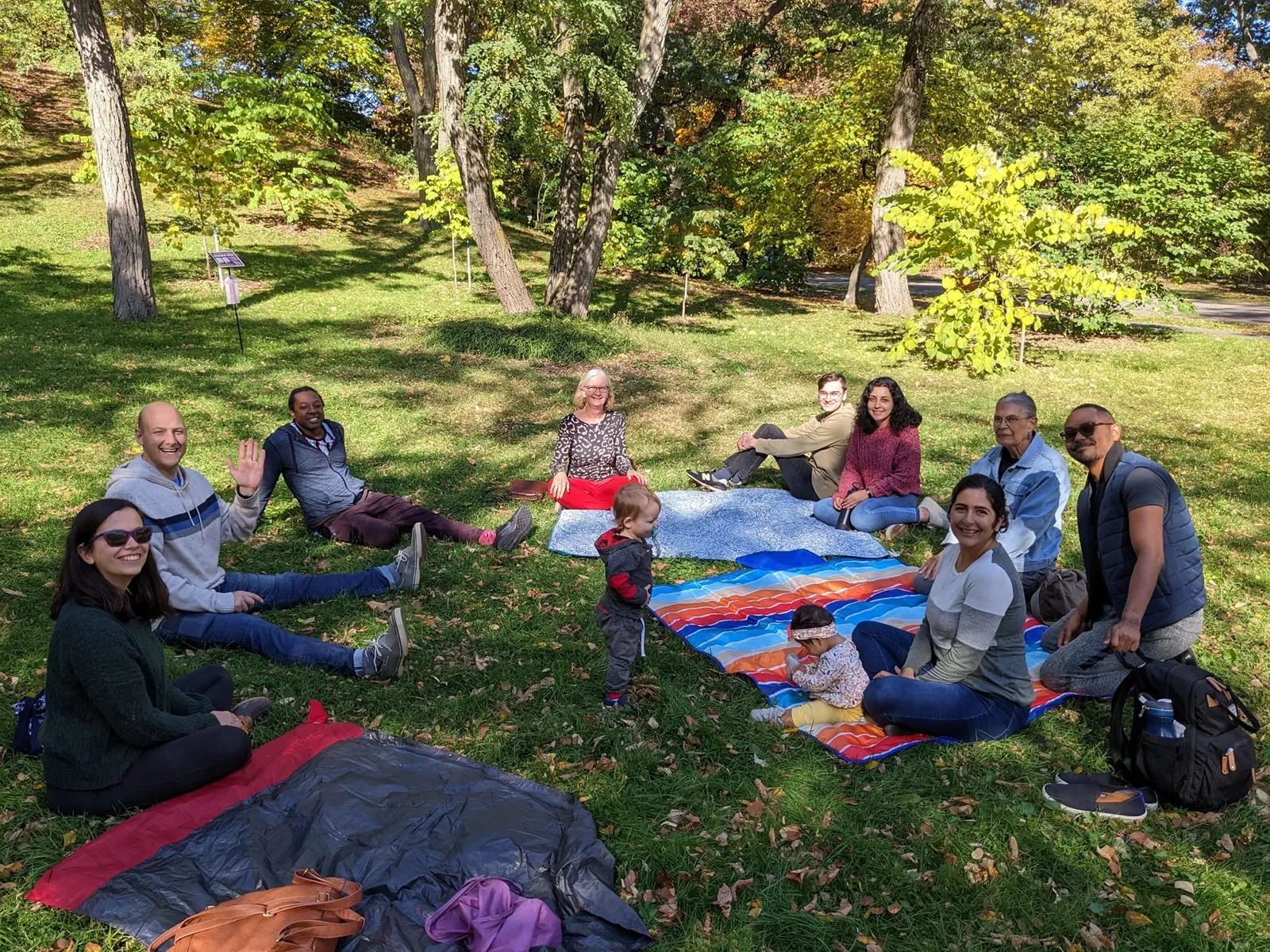 Outdoor devotional gathering in a park