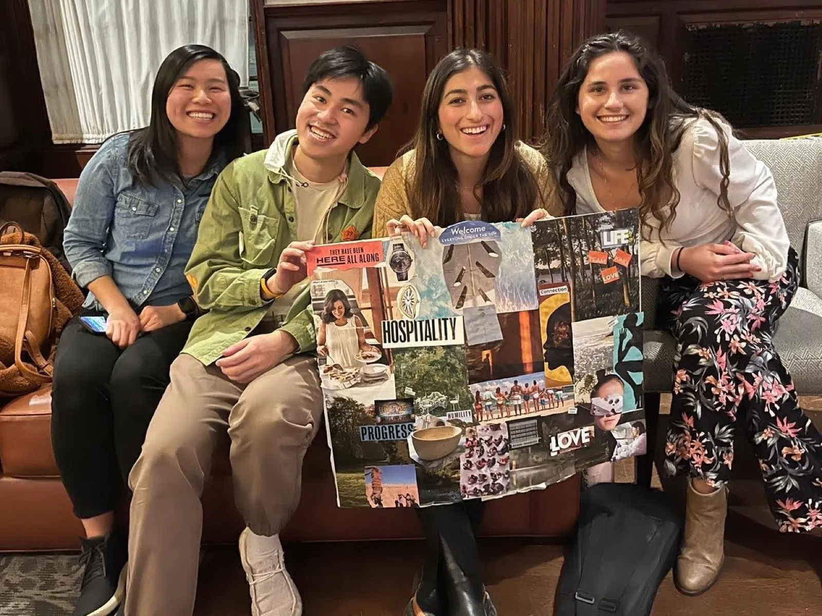 Young adults with a vision board they made together