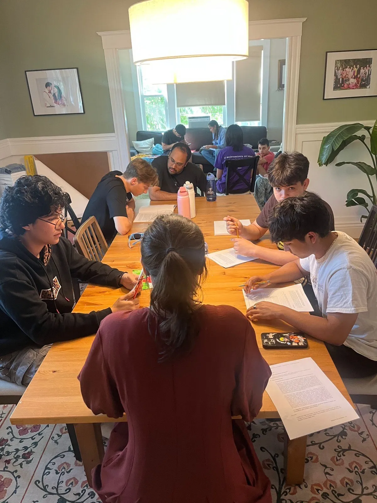 Teens laughing together during a group activity