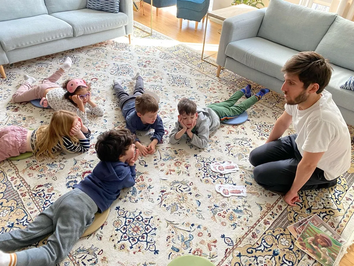 Children doing art at a table