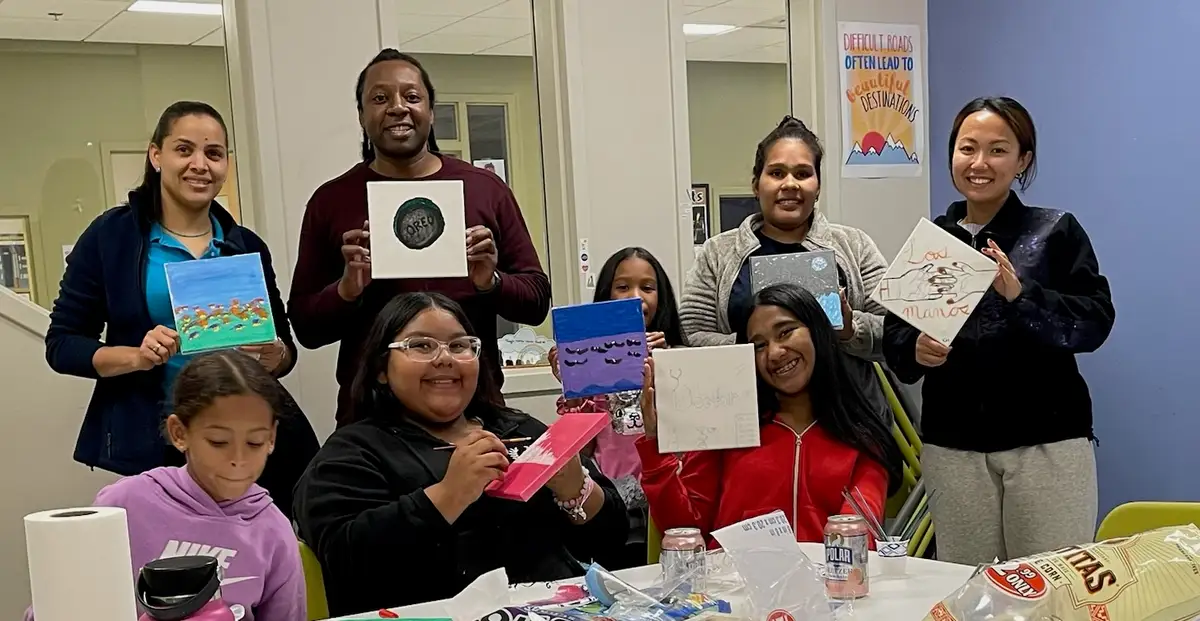 Teens working on an art activity together at Mission Park