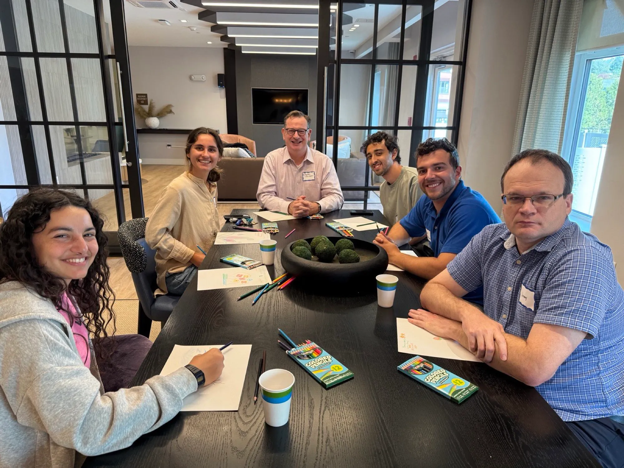 Study circle group around a table